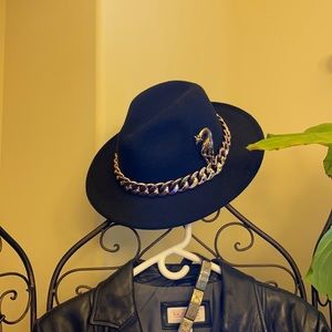 Adventurer black felt hat. Gold chain band. Giraffe not included.